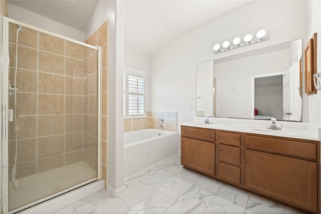 bathroom with connected bathroom, marble finish floor, and a sink