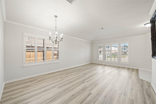 empty room with light wood-style floors, baseboards, visible vents, and crown molding