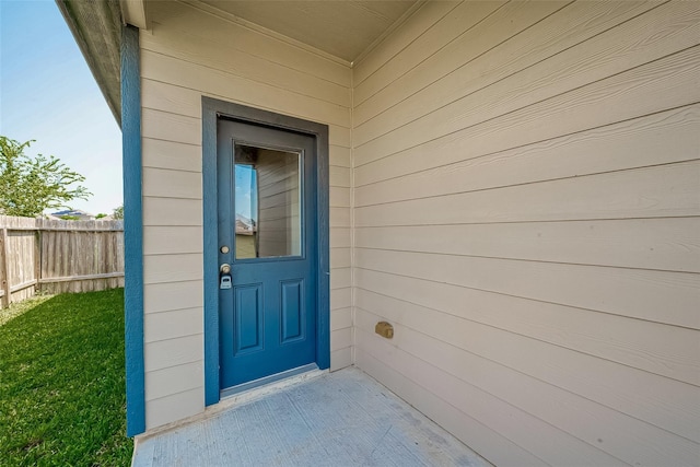 property entrance with fence