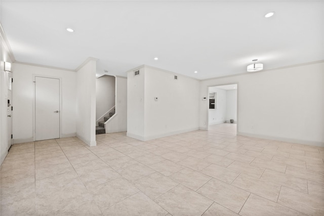 unfurnished room with baseboards, ornamental molding, stairway, and recessed lighting