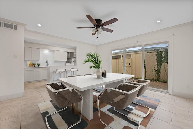 dining area with light tile patterned floors, baseboards, visible vents, and recessed lighting