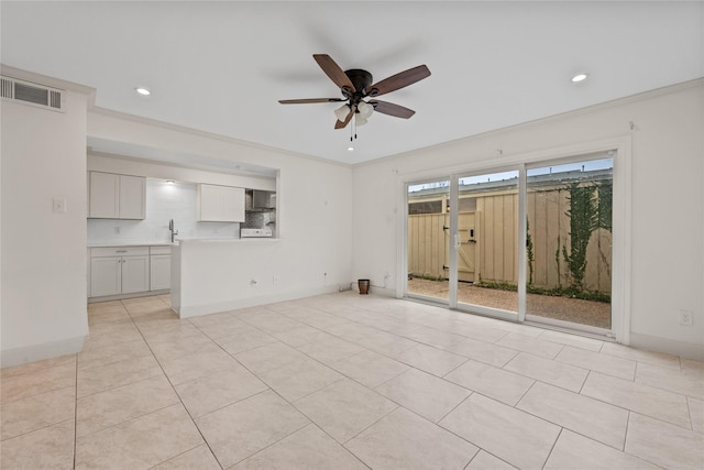 5874 Doliver Dr Unit 121, Houston, TX 77057 - spare room with a ceiling fan, recessed lighting, light tile patterned flooring, a sink, and baseboards