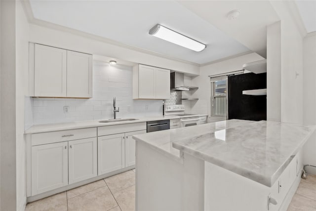 kitchen featuring white cabinets, wall chimney exhaust hood, ornamental molding, stainless steel appliances, and a sink