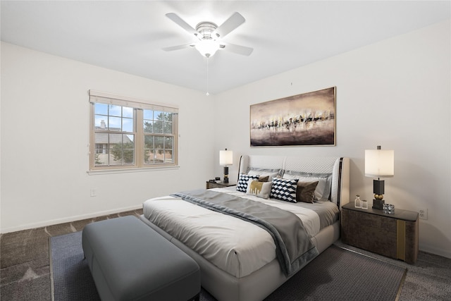 bedroom with carpet floors, a ceiling fan, and baseboards