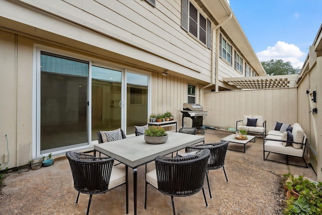 5874 Doliver Dr Unit 121, Houston, TX 77057 - view of patio with area for grilling, an outdoor hangout area, and outdoor dining space