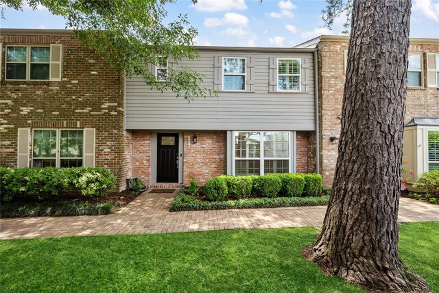 5874 Doliver Dr Unit 121, Houston, TX 77057 - multi unit property featuring brick siding and a front lawn