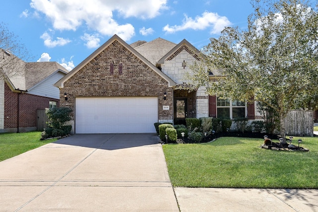 view of front of property with a garage, brick siding, driveway, stone siding, and a front yard