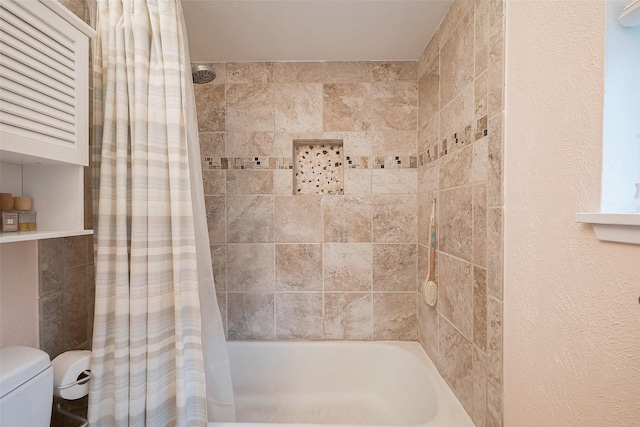 full bath with toilet and shower / bath combination with curtain