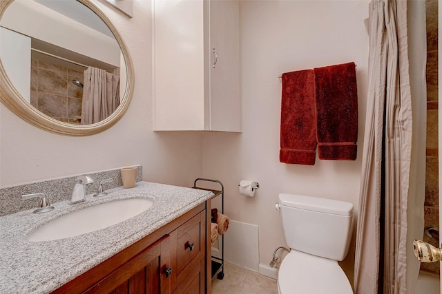 bathroom with toilet, a shower with curtain, tile patterned floors, and vanity