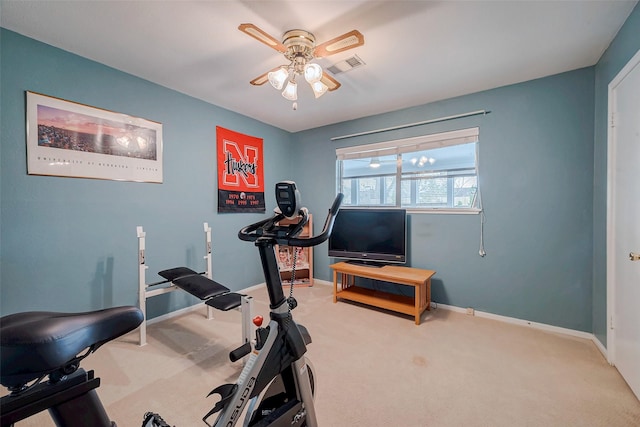 workout area featuring a ceiling fan, baseboards, visible vents, and carpet flooring