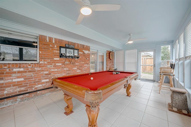 game room featuring billiards, brick wall, tile patterned flooring, and a ceiling fan