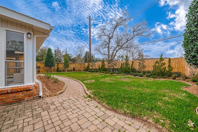 view of yard featuring a fenced backyard