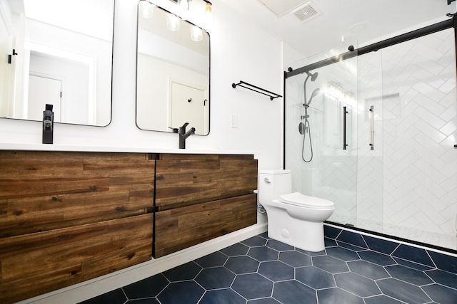 full bathroom with toilet, double vanity, a shower stall, and visible vents