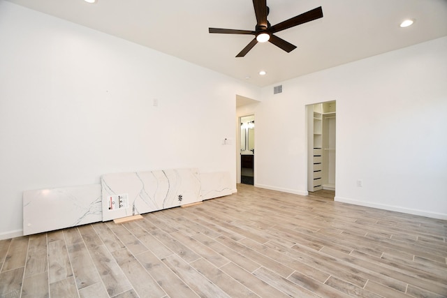 unfurnished room featuring visible vents, ceiling fan, light wood-style flooring, and recessed lighting