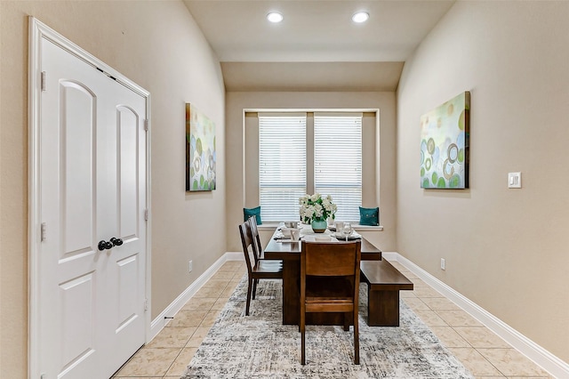 dining room featuring recessed lighting, baseboards, and light tile patterned floors