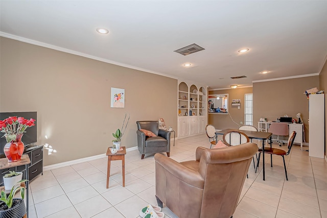 living room featuring light tile patterned floors, baseboards, visible vents, and crown molding