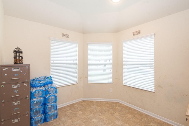 interior space featuring baseboards