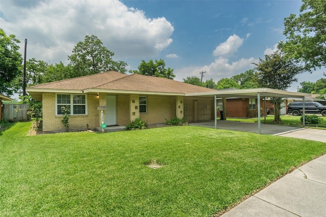 single story home featuring a front lawn, concrete driveway, and brick siding