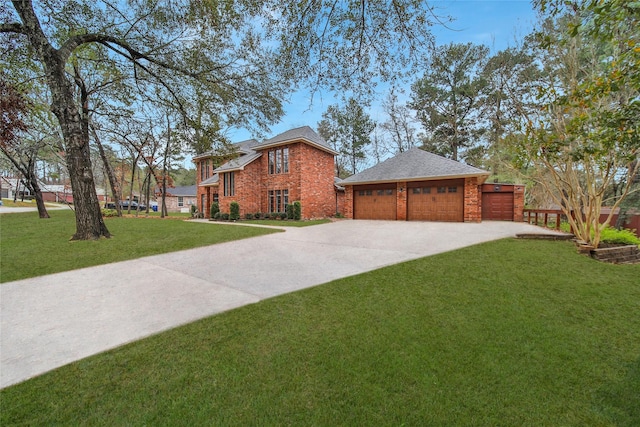 view of front of home with a garage, a front yard, and brick siding