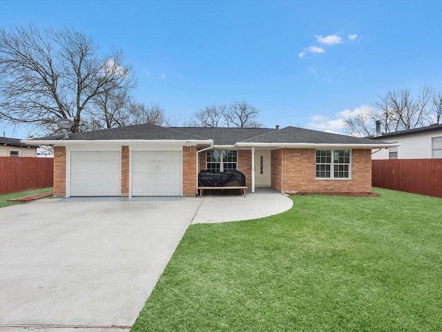 ranch-style house with a garage, brick siding, fence, and a front lawn