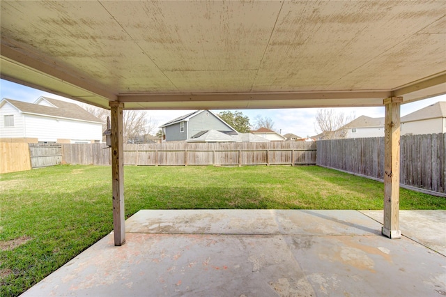 view of yard with a patio area and a fenced backyard