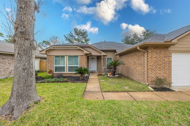 ranch-style house with a garage, brick siding, and a front lawn