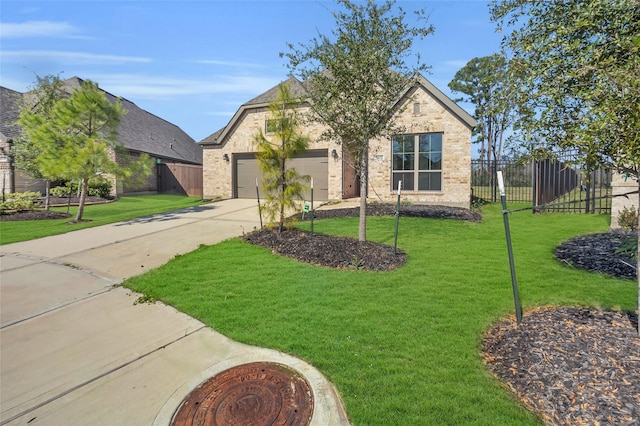 view of front facade featuring a garage, driveway, brick siding, and a front yard