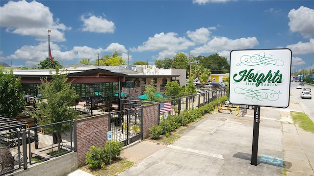 view of community with fence