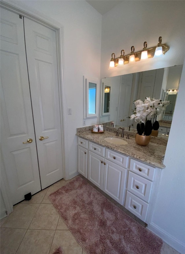 bathroom featuring vanity and tile patterned floors