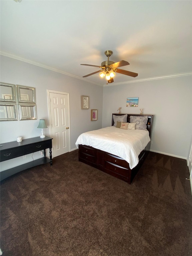 bedroom with baseboards, dark colored carpet, a ceiling fan, and crown molding