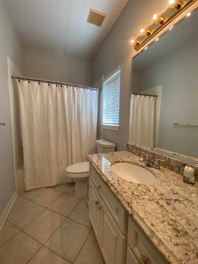 bathroom with shower / bath combo, visible vents, toilet, tile patterned floors, and vanity