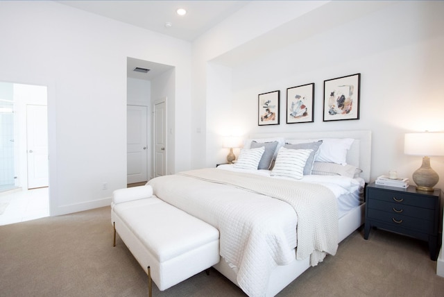 bedroom featuring light carpet, recessed lighting, visible vents, and baseboards