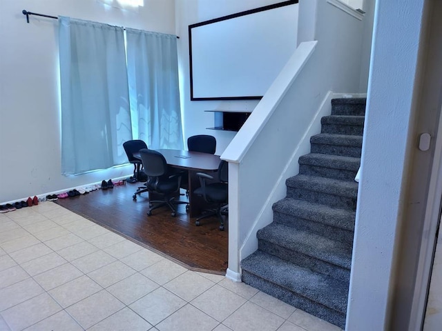 office area featuring light tile patterned flooring