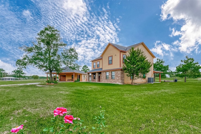 view of front of property featuring a front yard and brick siding