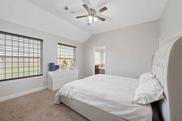 bedroom featuring carpet floors, a ceiling fan, visible vents, vaulted ceiling, and baseboards