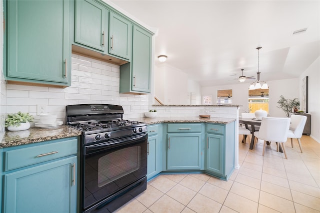 kitchen with black range with gas cooktop, a peninsula, visible vents, hanging light fixtures, and tasteful backsplash