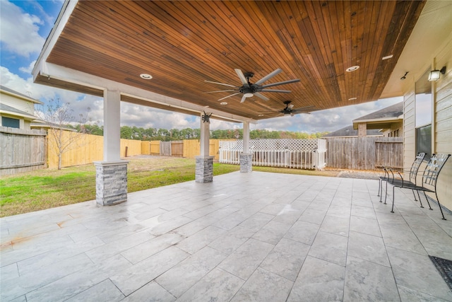 view of patio featuring a ceiling fan and a fenced backyard