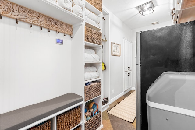 mudroom featuring baseboards