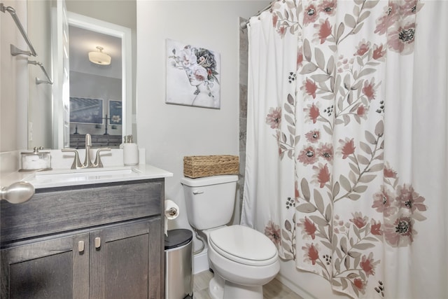 full bathroom with toilet, shower / tub combo, and vanity