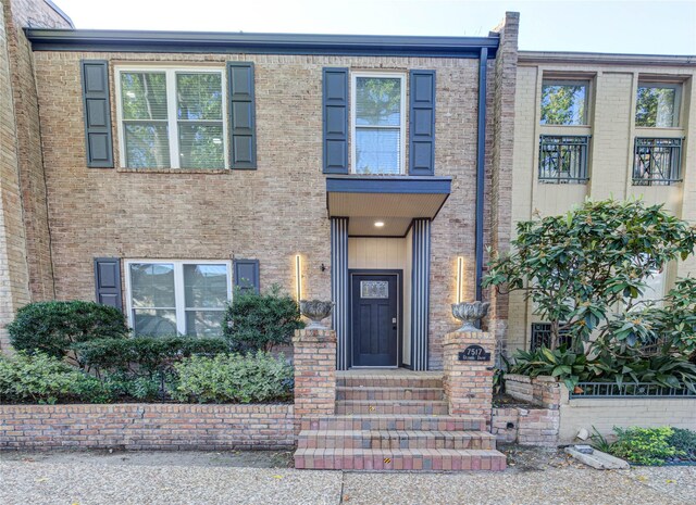 7517 Olympia Dr, Houston, TX 77063 - view of front of home with entry steps and brick siding