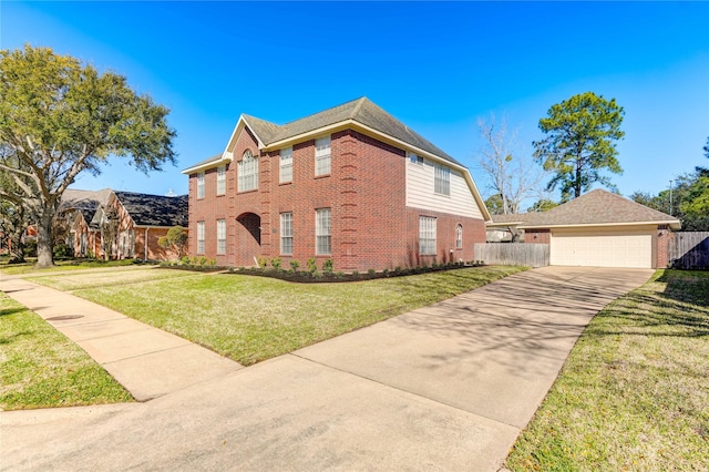 view of front of house featuring brick siding, an outdoor structure, a front lawn, and fence