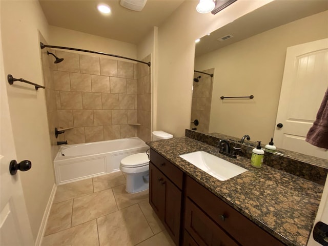 full bathroom featuring baseboards, toilet, tile patterned floors, tub / shower combination, and vanity