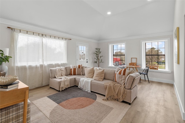 living room with light wood-style floors, recessed lighting, crown molding, and baseboards