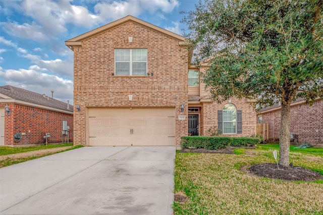 traditional home featuring a front lawn, brick siding, driveway, and an attached garage