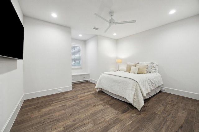 bedroom featuring baseboards, visible vents, wood finished floors, and recessed lighting