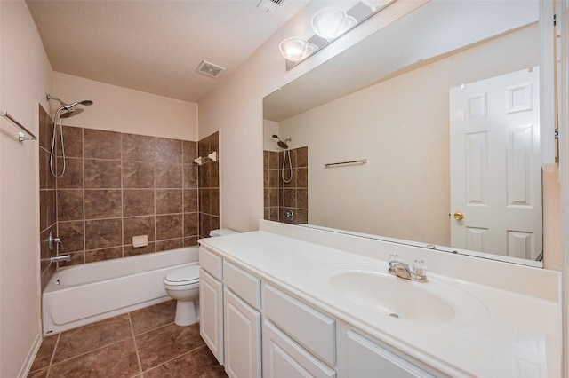 full bath featuring vanity, visible vents, bathing tub / shower combination, tile patterned floors, and toilet