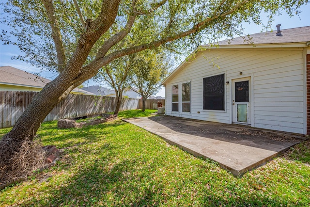 view of yard with a patio and a fenced backyard