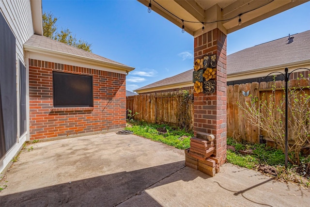 view of patio / terrace with fence