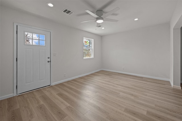 foyer entrance featuring baseboards, visible vents, a ceiling fan, light wood-style floors, and recessed lighting