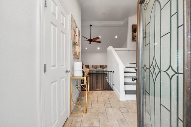 foyer featuring ceiling fan